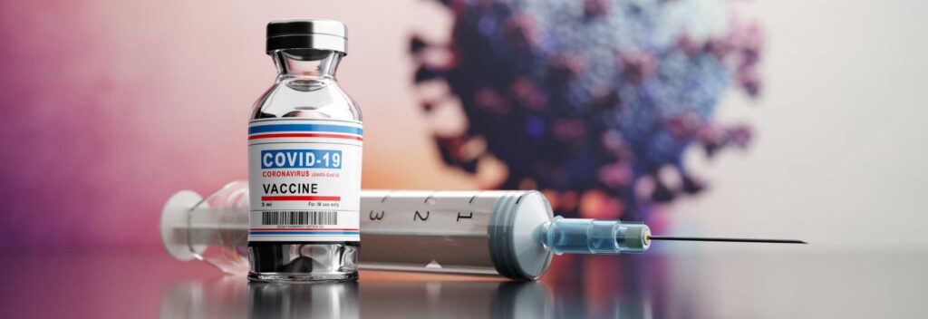 Imagen con fines ilustrativos con representación de una vacuna contra la COVID-19