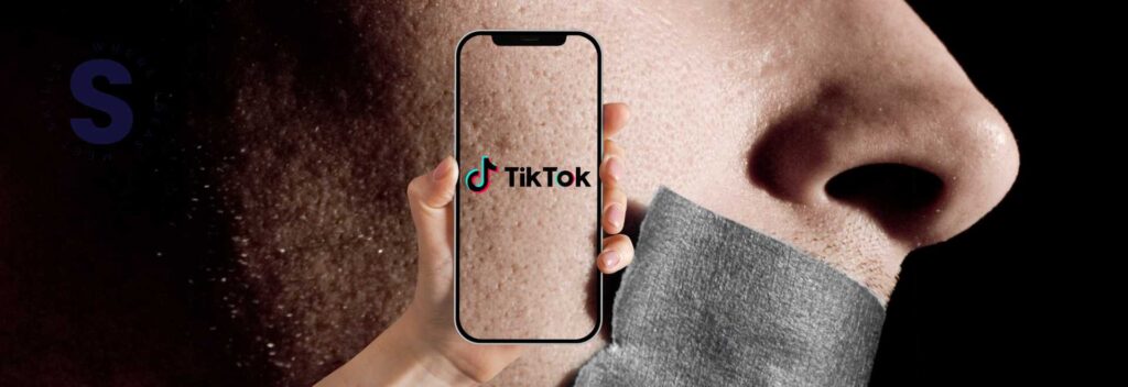 Hombre con cinta en la Boca, sobre el una ilustración de un móvil con el logo de tiktok