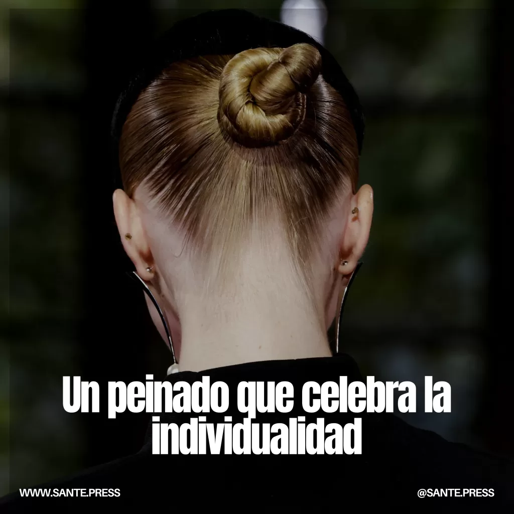 Peinado de moño de lado, símbolo de la moda actual en España, fusionando nostalgia y creatividad en estilos personalizados.