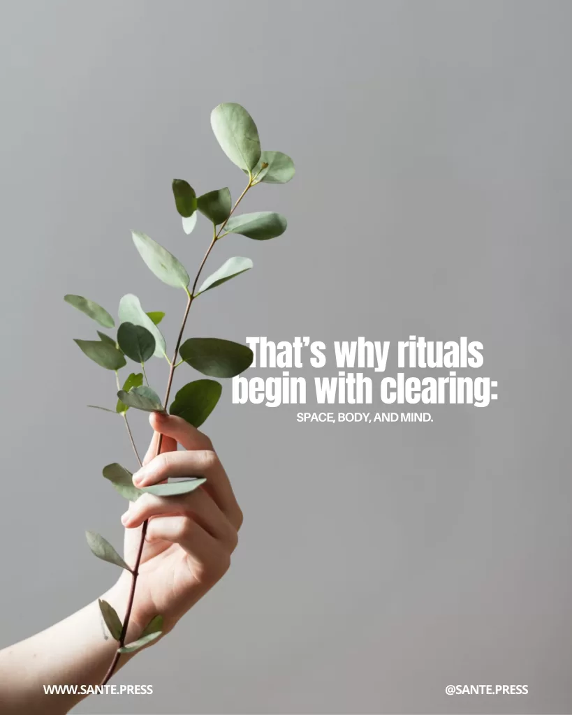 Hand holding a green branch with rounded leaves against a neutral background. Text: “That’s why rituals begin with clearing: space, body, and mind.” Sante Press branding.