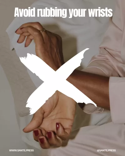 Rubbing wrists after applying perfume alters its scent; instead, spray and let it absorb naturally for optimal fragrance.