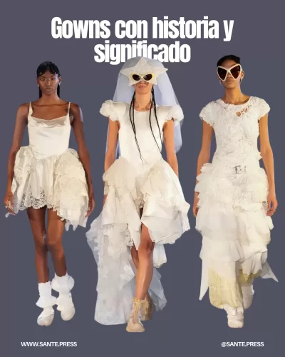 Vestidos de novia y primera comunión antiguos en el desfile, simbolizando amor propio e independencia, cerrando con un beso.