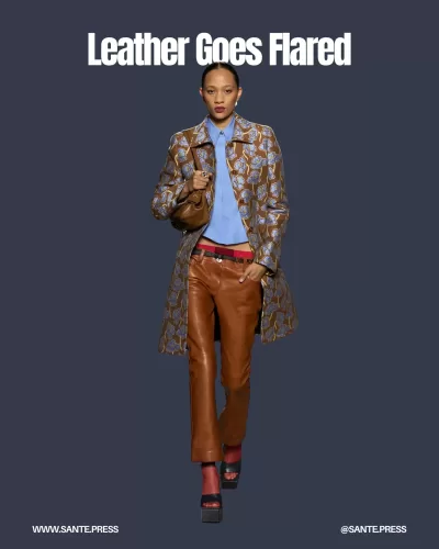 Cropped leather flared pants in earthy tones showcased at Versace, blending boho chic with elegance and functionality for Spring-Summer 2025.