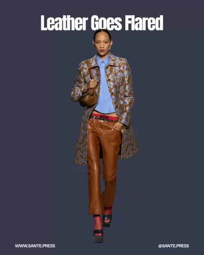 Cropped leather flared pants in earthy tones showcased at Versace, blending boho chic with elegance and functionality for Spring-Summer 2025.