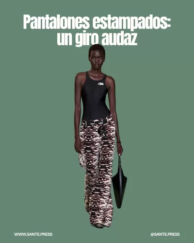 Pantalones acampanados estampados de Tory Burch, con diseños audaces como llamas y cebra, ideales para un look elegante y atrevido.