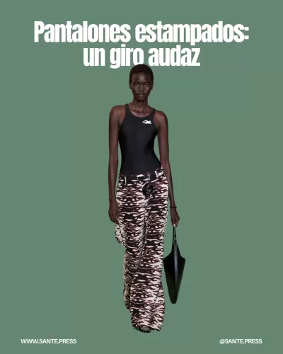 Pantalones acampanados estampados de Tory Burch, con diseños audaces como llamas y cebra, ideales para un look elegante y atrevido.